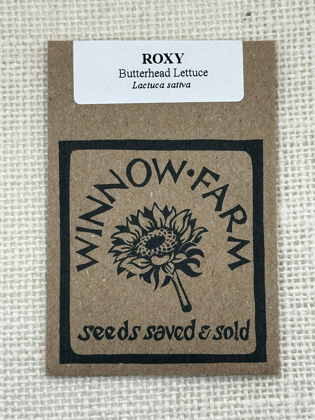 Winnow Farm seed packet for Butterhead Lettuce on a textured beige background